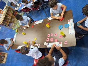 Children making art with clay